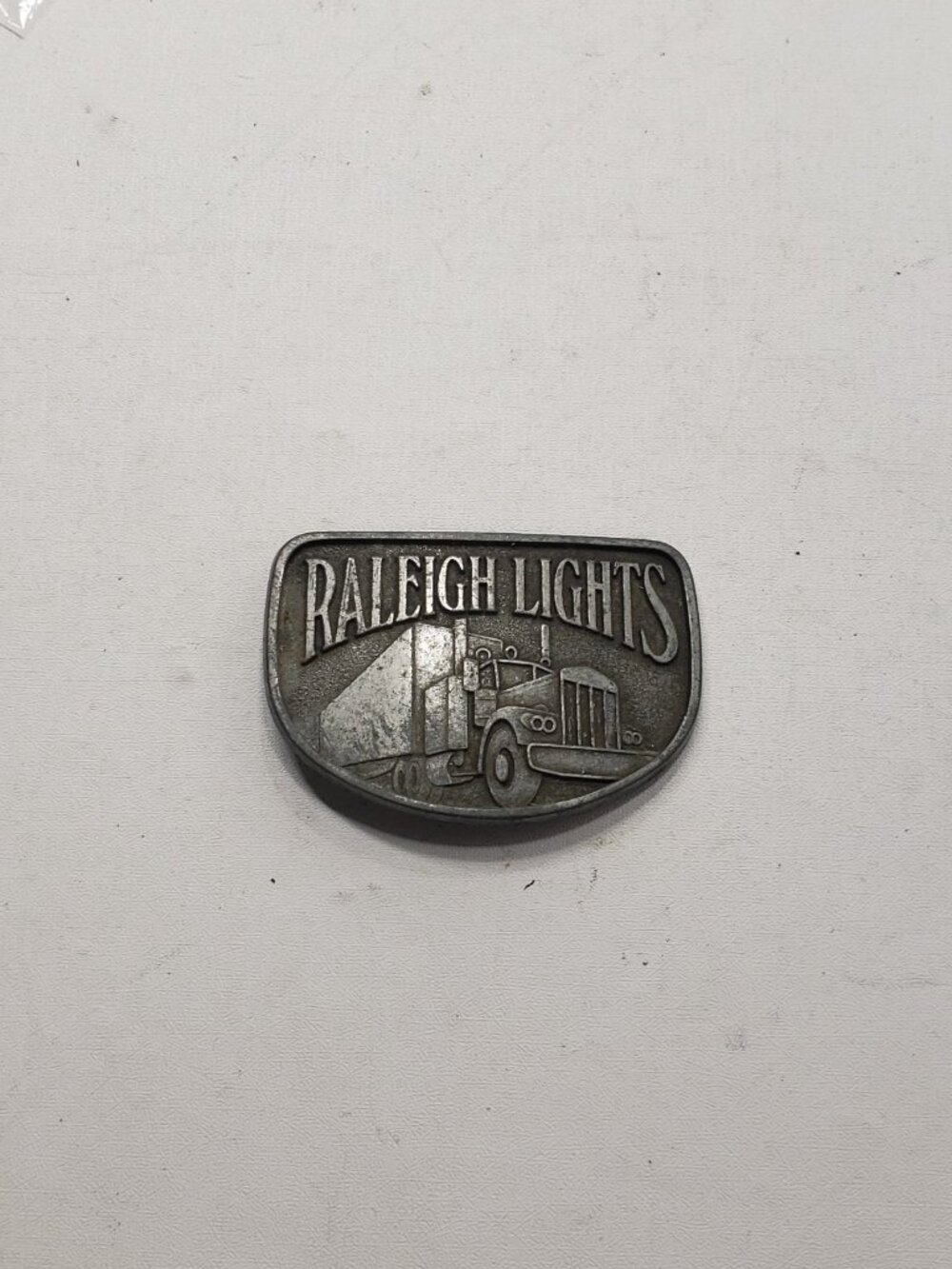 Vintage Raleigh Lights Cigarettes Advertising Belt Buckle Semi Truck Pewter Tone